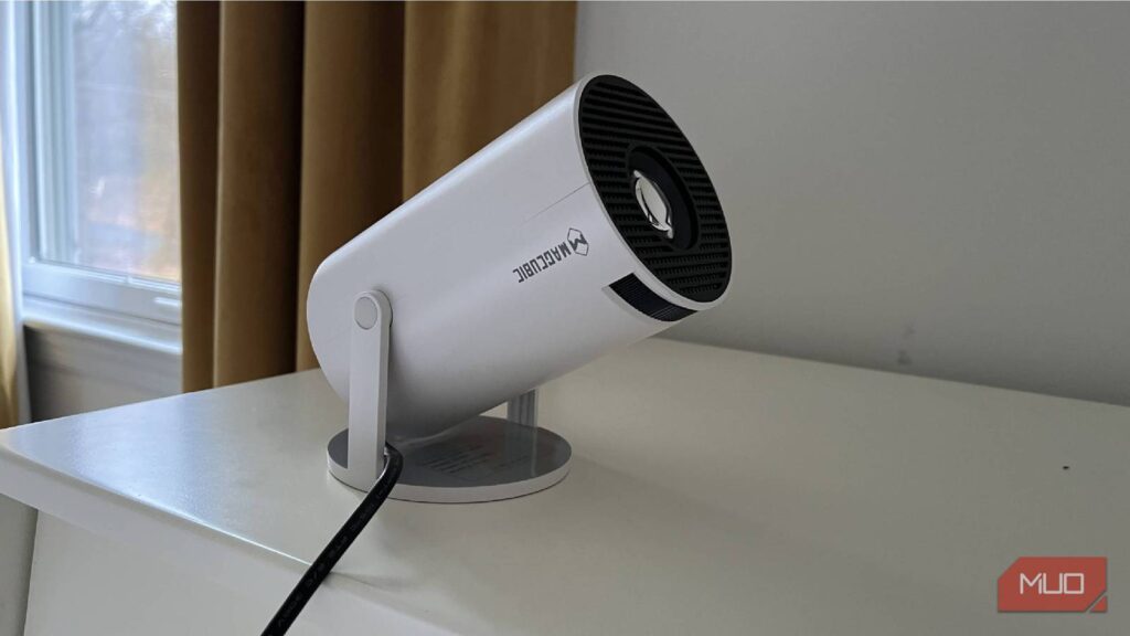 I watch movies on a projector instead of a TV, and it’s cheaper than you think